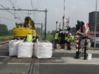 Herstelwerkzaamheden bij Halfweg na aanrijding met bus