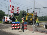 Herstelwerkzaamheden bij Halfweg na aanrijding met bus